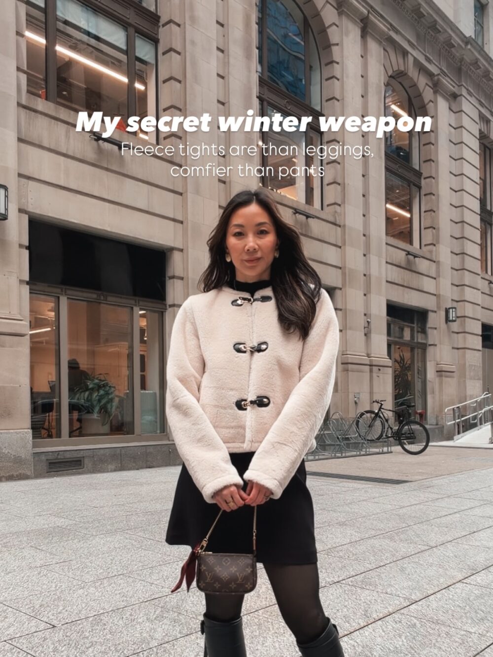 YesMissy wearing a winter skirt outfit styled with fleece-lined tights and tall boots, a warm city winter layering trick to stay comfortable while looking chic.