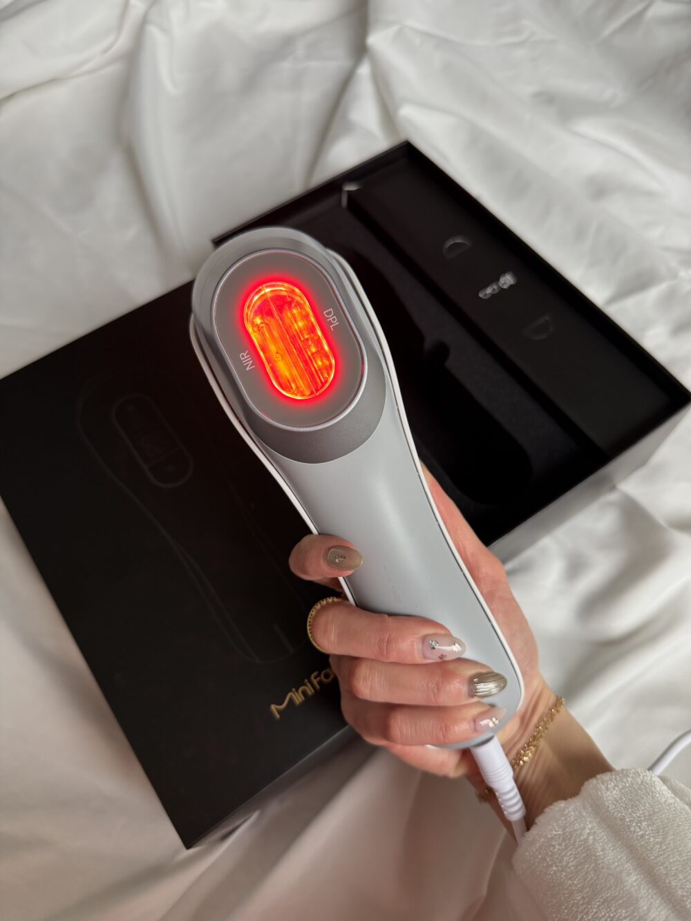 ViQure Lumirea DPL and NIR photofacial device close-up showing sapphire cooling tip
